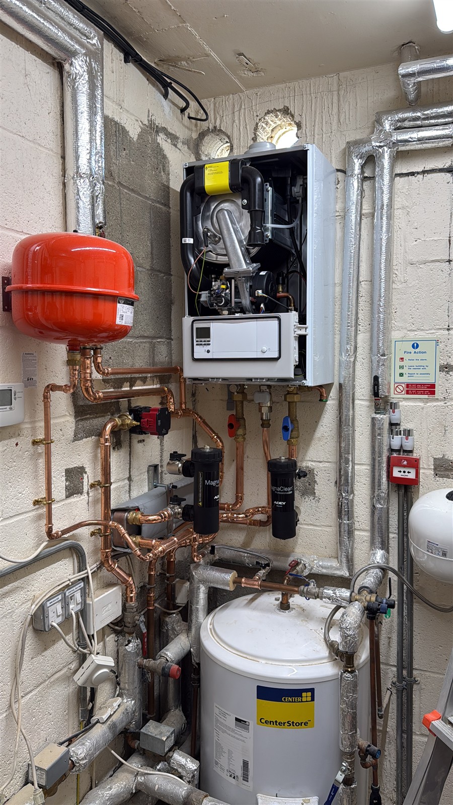 Wall-mounted Vaillant boiler with front casing removed in the Carterton Community Hall plant room