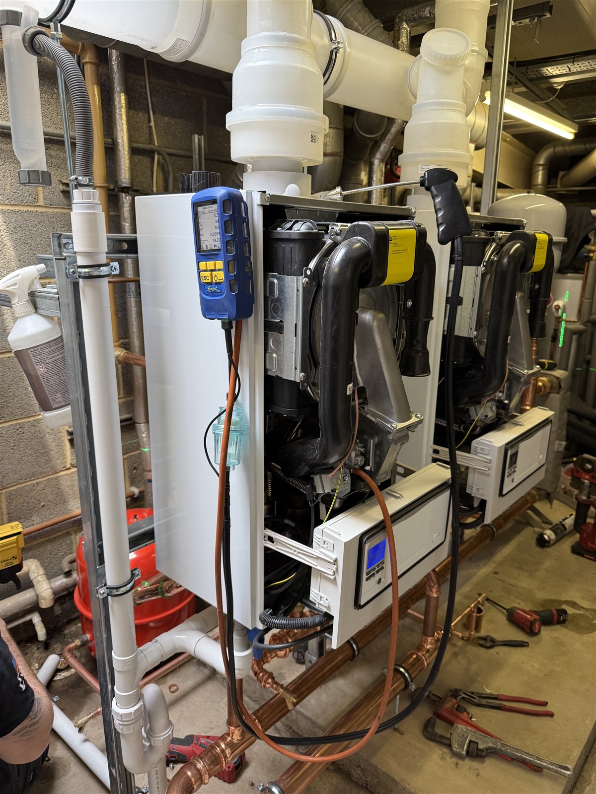 Combustion analyser connected beside the open Vaillant boilers at LTI Metaltech