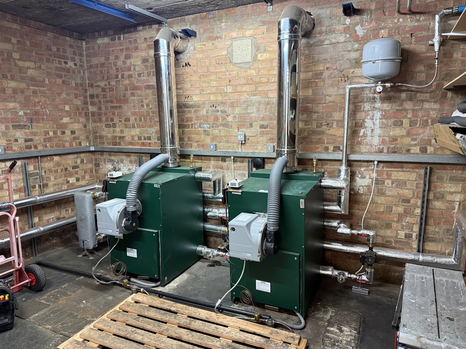 Twin Firebird boilers and insulated pipework at Mulberry Bush School
