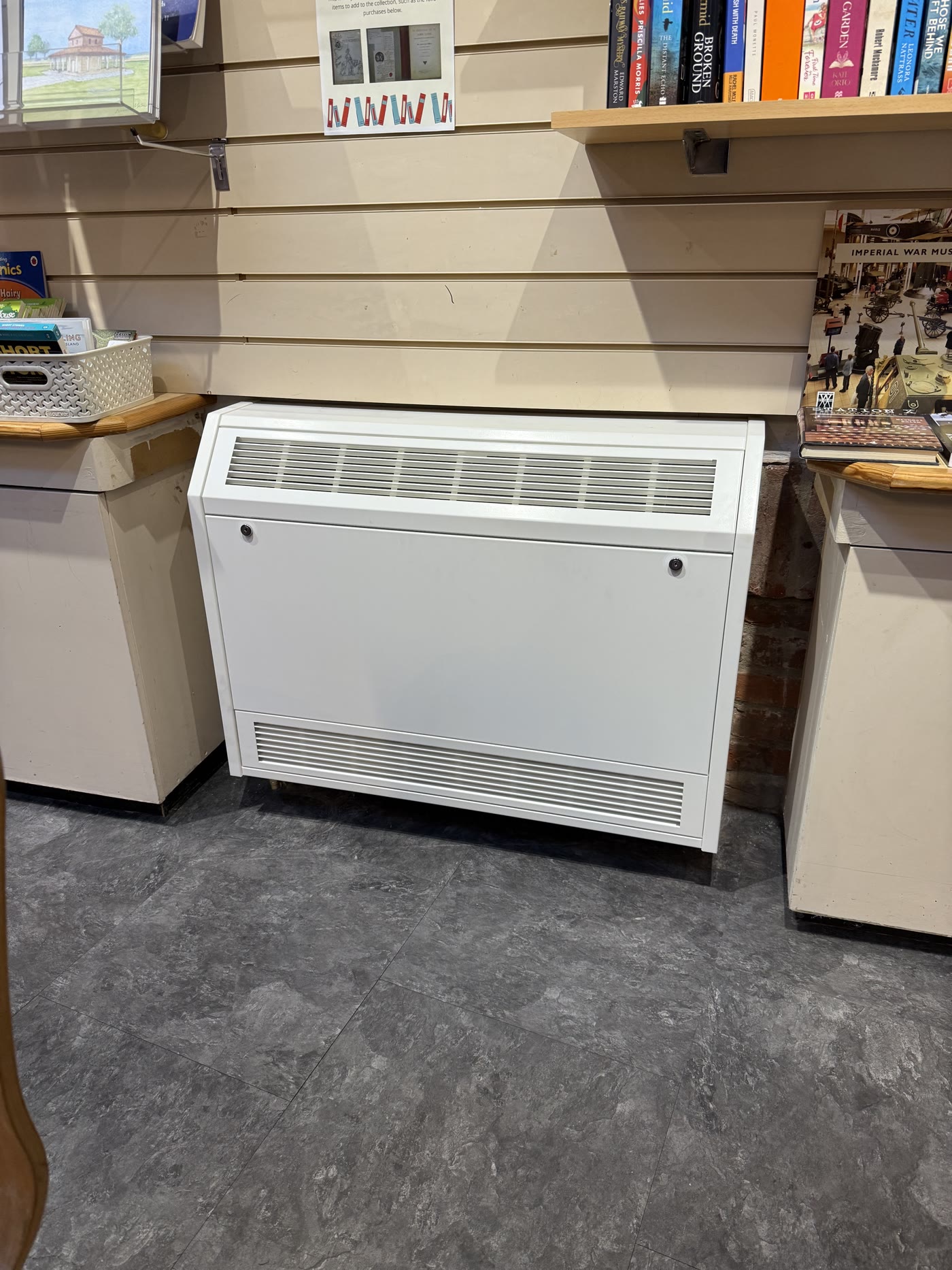 Replacement commercial floor-standing room convector heater in the same position